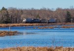 Eastbound local freight train PO-74 crosses the Snag Pond causeway